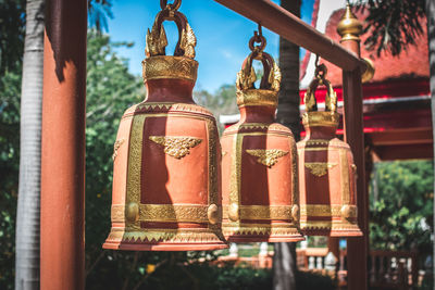 Close-up of lanterns hanging in temple