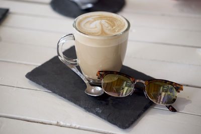 High angle view of coffee cup on table