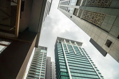 Low angle view of modern buildings against sky