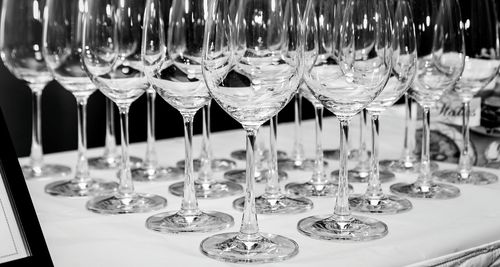 Close-up of wineglasses on table