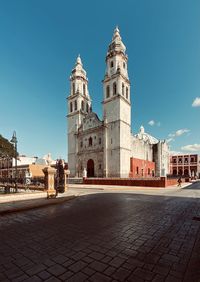 View of old building against blue sky