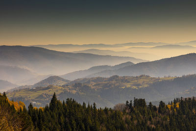 Scenic view of mountains against sky during sunset