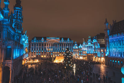 Illuminated buildings in city at night