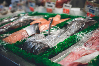 High angle view of fishes on market stall