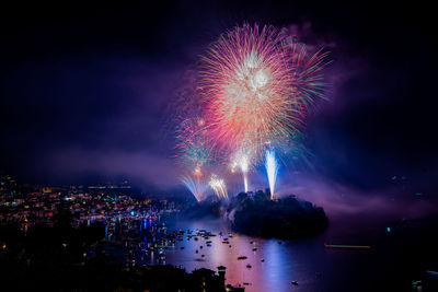 Firework display at night