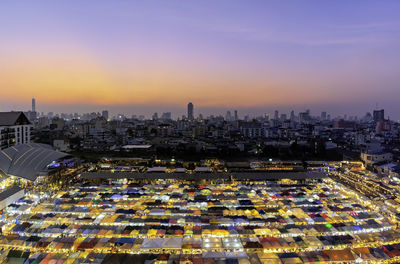 Train night market a gathering of food, clothing, jewelry. and many more, thais and foreigners like