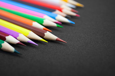 High angle view of colored pencils on table