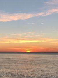 View of calm sea at sunset