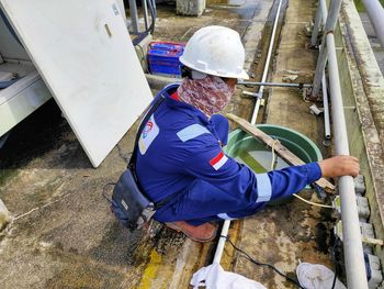 High angle view of man working at construction site