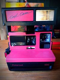 Close-up of camera on table