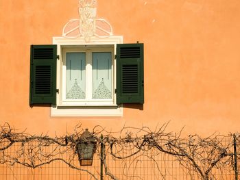 Exterior of house against orange sky