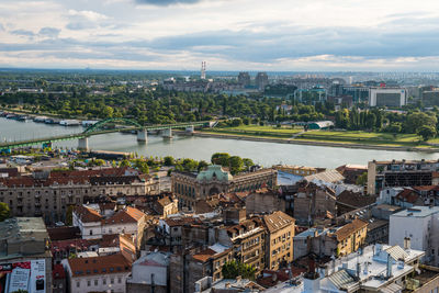 High angle view of buildings in city against sky