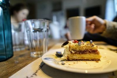 Close-up of cake served on table