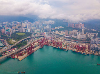 High angle view of river amidst buildings in city