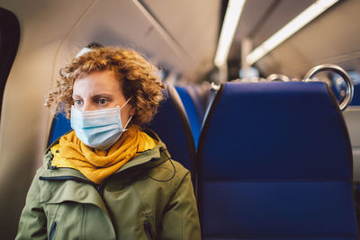 Portrait of woman in airplane