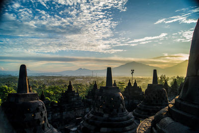 Panoramic view of temple against cloudy sky