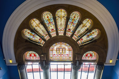 Low angle view of ornate window in building