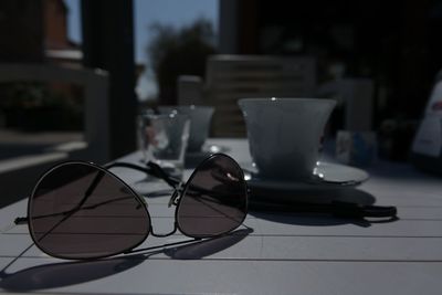 Close-up of sunglasses on table