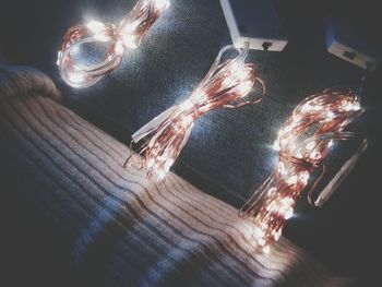 High angle view of illuminated light painting on table