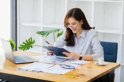 Businesswoman working at office