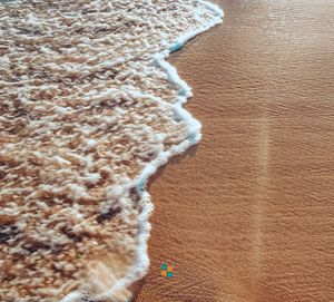 High angle view of surf on beach