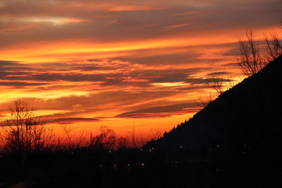 Scenic view of dramatic sky during sunset