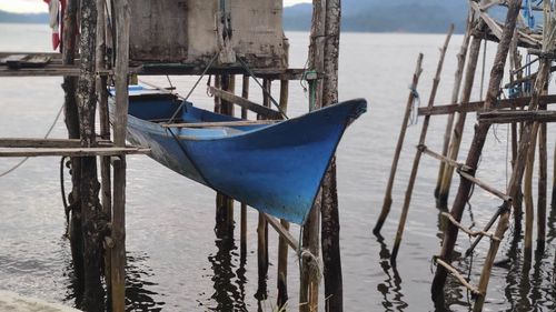 Close-up of wooden post in sea