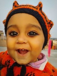 Close-up portrait of smiling boy