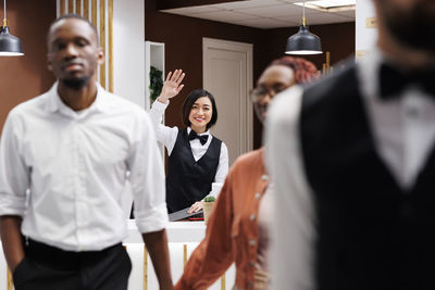 Portrait of business colleagues standing in office