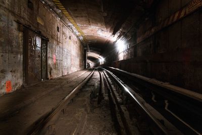Railroad tracks in tunnel