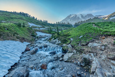 Scenic view of rocky mountains against sky