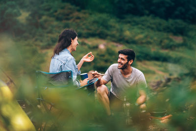 Young couple on field