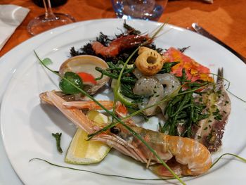 High angle view of fruit salad in plate on table