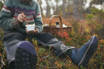 Hiker eating outside