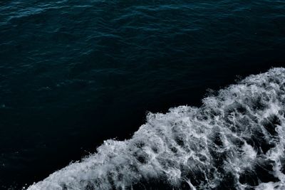 High angle view of water flowing in sea