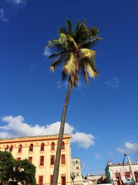 Low angle view of building against blue sky