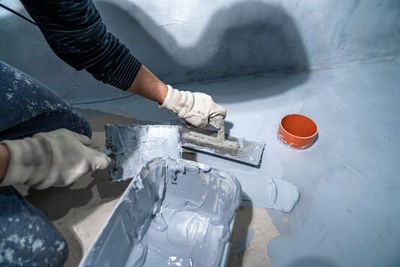 Cropped image of man working on table