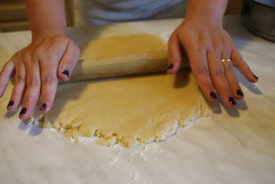 Midsection of woman preparing food