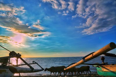 Scenic view of sea against cloudy sky
