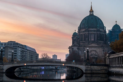 View of buildings against cloudy sky