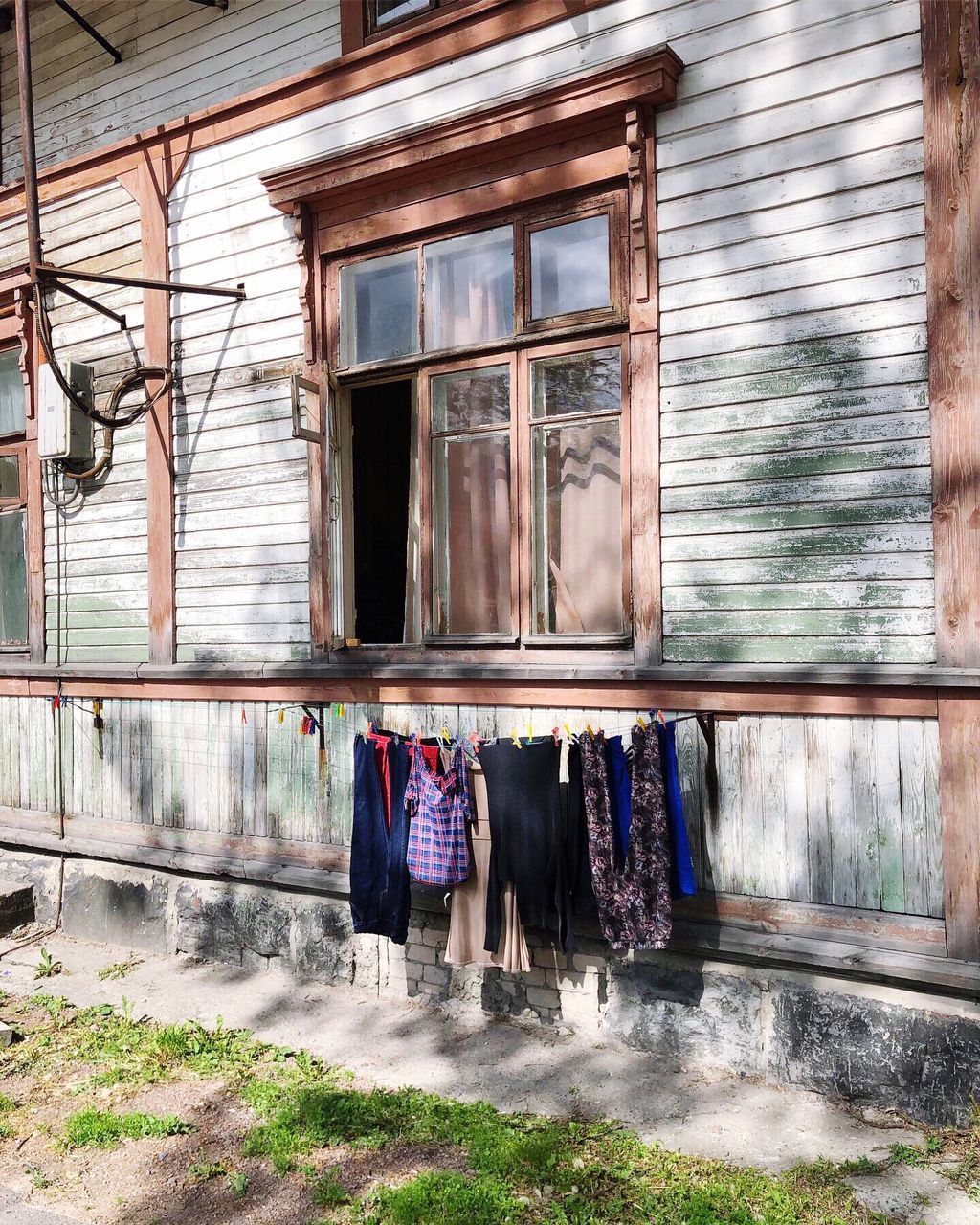 CLOTHES DRYING ON BUILDING