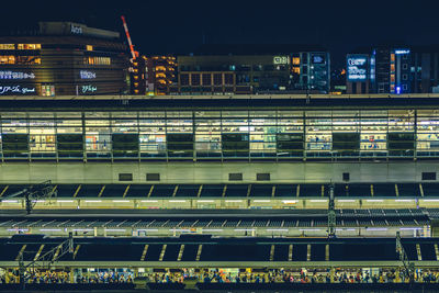 Low angle view of kyoto station platform at night