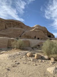 Rock formations in desert against sky