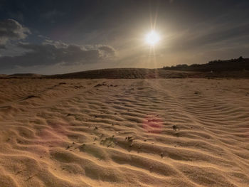 Scenic view of desert against sky