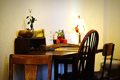 Close-up of chair on table at home