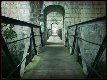 Footbridge with bridge in background