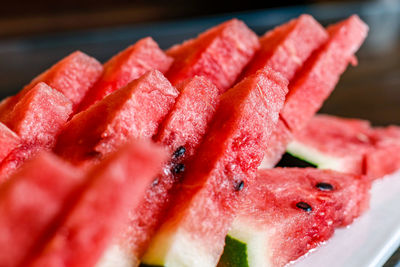 Close-up of chopped fruits in plate