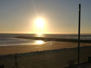 Scenic view of beach during sunset