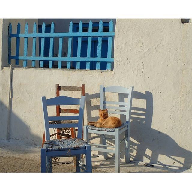 chair, table, food and drink, built structure, food, absence, empty, architecture, day, indoors, relaxation, auto post production filter, no people, transfer print, sitting, bench, building exterior, wood - material, sunlight, still life