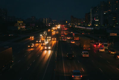 High angle view of illuminated city at night